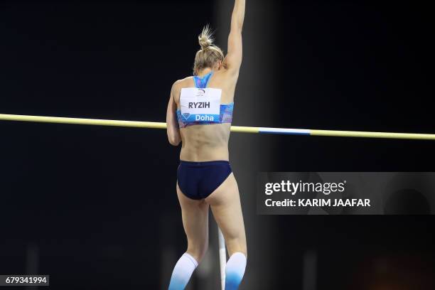 Germany's Lisa Ryzih competes in the women's pole vault during the Diamond League athletics competition at the Suhaim bin Hamad Stadium in Doha, on...