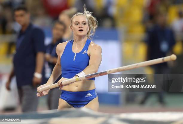 Katie Nageotte competes in the women's pole vault during the Diamond League athletics competition at the Suhaim bin Hamad Stadium in Doha, on May 5,...