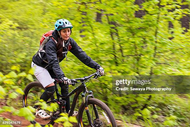 a mountain biker enjoying oregon single track. - sawaya stock pictures, royalty-free photos & images