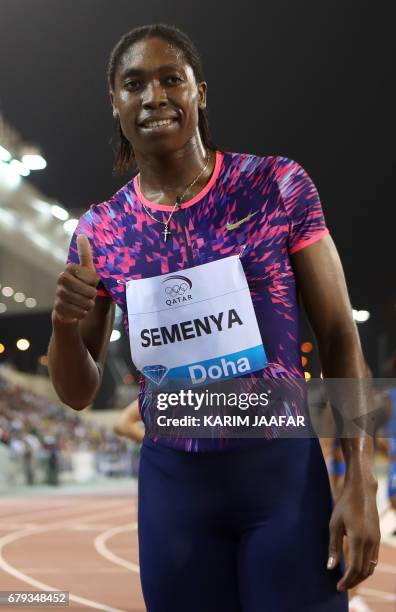 South Africa's Caster Semenya gives the thumbs up after winning the women's 800 metres during the Diamond League athletics competition at the Suhaim...