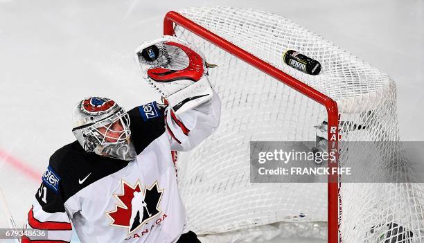 Canada's goalkeeper Calvi Pickard stops the puck during the IIHF Men's World Championship group B ice hockey match between the Czech Republic and...