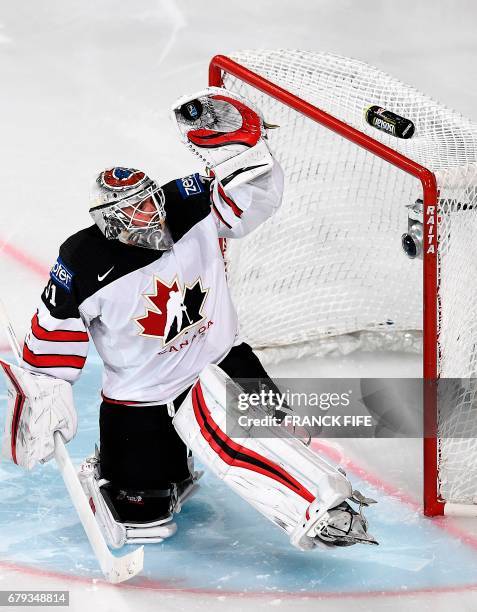 Canada's goalkeeper Calvi Pickard stops the puck during the IIHF Men's World Championship group B ice hockey match between the Czech Republic and...