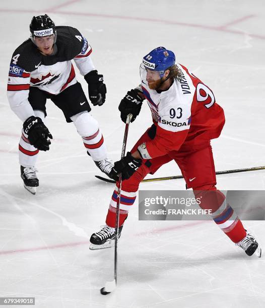 Canada's defender Tyson Barrie challenges Czech Republic's forward Jakub Voracek during the IIHF Men's World Championship group B ice hockey match...