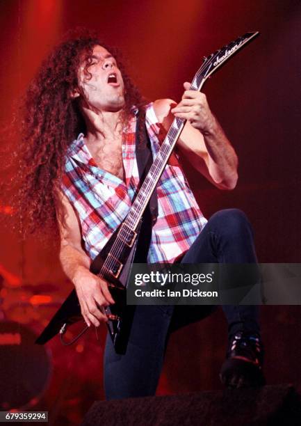 Marty Friedman of Megadeth performing on stage at Hammersmith Odeon, London, 30 September 1992.