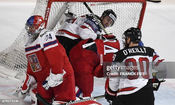 Canada's forward Mark Scheifele vies with Czech Republic's defender Tomas Kundratek during the IIHF Men's World Championship group B ice hockey match...