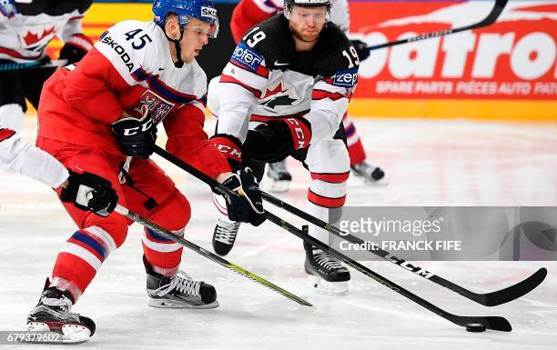 Canada's defender Mike Matheson challenges Czech Republic's defender Radim Simek during the IIHF Men's World Championship group B ice hockey match...