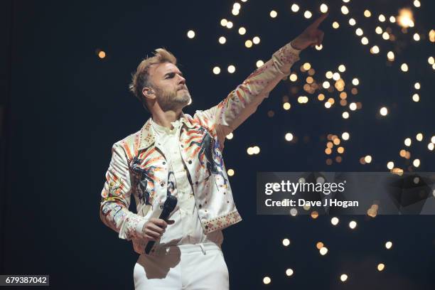 Gary Barlow of Take That performs on the opening night of Wonderland Live 2017 at Genting Arena on May 5, 2017 in Birmingham, United Kingdom.