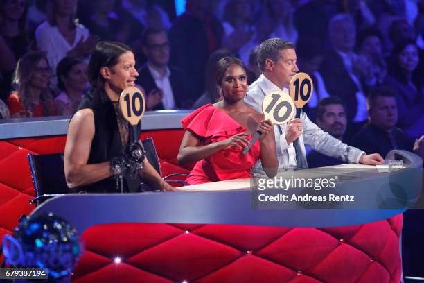 Jorge Gonzalez, Motsi Mabuse and Joachim Llambi on stage during the 7th show of the tenth season of the television competition 'Let's Dance' on May...