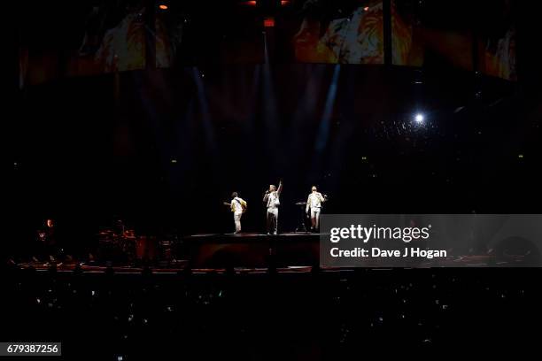 Mark Owen, Gary Barlow and Howard Donald of Take That perform on the opening night of Wonderland Live 2017 at Genting Arena on May 5, 2017 in...