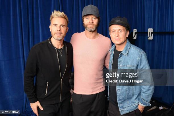 Gary Barlow, Howard Donald and Mark Owen of Take That at the opening night of Wonderland Live 2017 at Genting Arena on May 5, 2017 in Birmingham,...