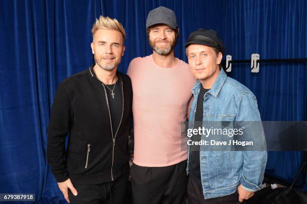 Gary Barlow, Howard Donald and Mark Owen of Take That at the opening night of Wonderland Live 2017 at Genting Arena on May 5, 2017 in Birmingham,...