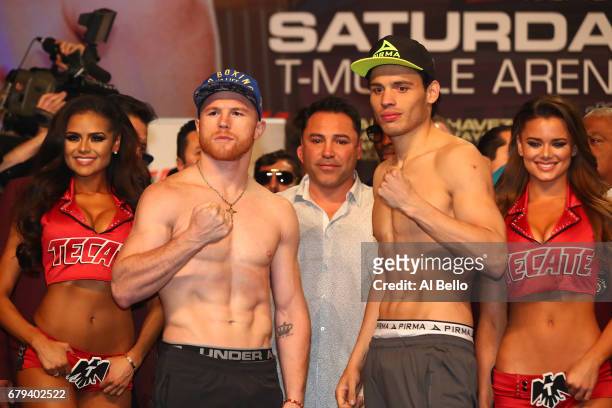 Boxers Canelo Alvarez and Julio Cesar Chavez Jr. Pose during their official weigh-in at MGM Grand Garden Arena on May 5, 2017 in Las Vegas, Nevada....