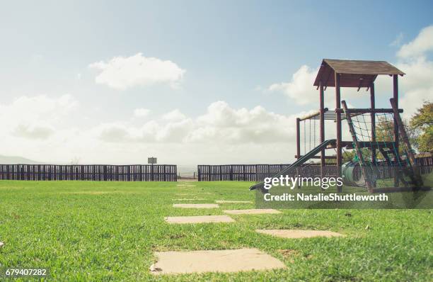 waiting for summer break - kinderspielplatz stock-fotos und bilder