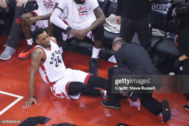 Toronto Raptors guard Norman Powell sits on the bench injured as the Toronto Raptors play the Cleveland Cavaliers in game 3 of their second round...