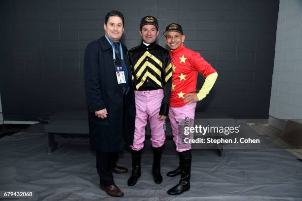 Jockey manager Darrell Haire poses with Jockeys Kent DeSormeaux and Mike Smith pose prior to the 143rd running of The Kentucky Oaks at Churchill...