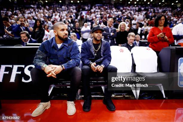 Rapper, Drake is seen at the game between the Toronto Raptors and the Cleveland Cavaliers in Game Three of the Eastern Conference Semifinals during...