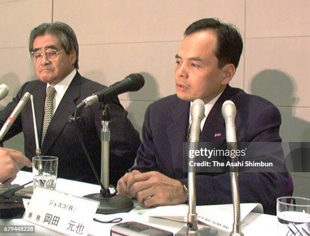 Supermarket chain JUSCO incoming president Motoya Okada speaks while chairman Takuya Okada listens during a press conference at the company...