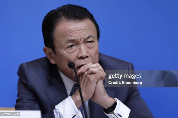 Taro Aso, Japan's deputy prime minister and finance minister, speaks during a news conference following the 20th ASEAN+3 Finance Ministers and...