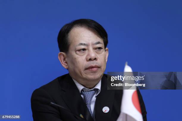 Masatsugu Asakawa, vice minister for international affairs at Japan's Ministry of Finance, attends a news conference following the 20th ASEAN+3...