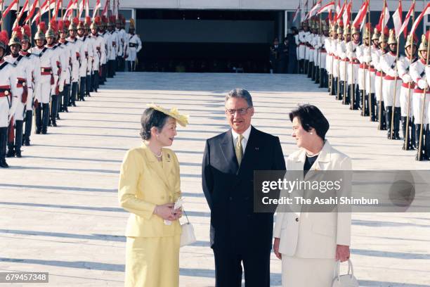 Empress Michiko talks with Brazilian President Fernando Henrique Cardoso and his wife Ruth Cardoso during the welcome ceremony at presidential palace...