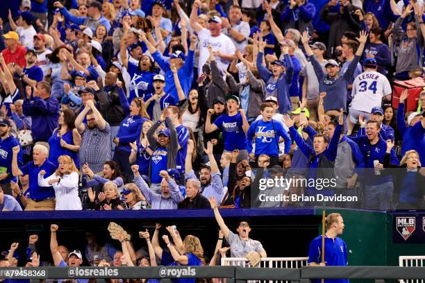 Fans react as Eric Hosmer of the Kansas City Royals hits a two run home run against the Cleveland Indians during the fifth inning at Kauffman Stadium...