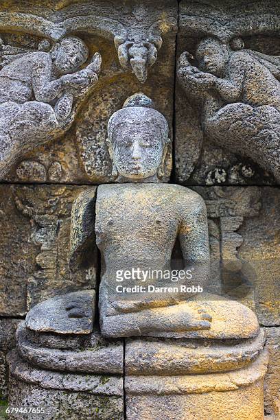 borobudur temple stone sculpture, java, indonesia - altorrelieve fotografías e imágenes de stock
