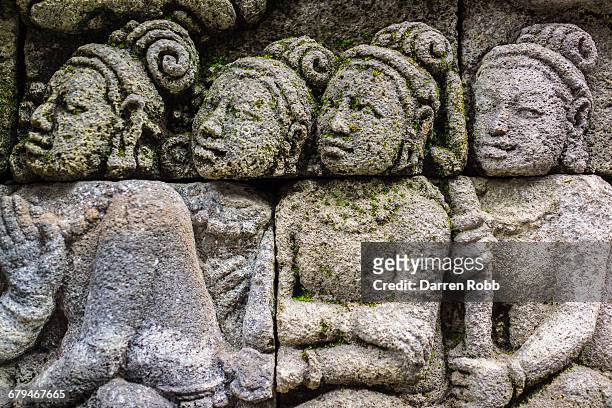 borobudur temple sculpture, java, indonesia - altorrelieve fotografías e imágenes de stock