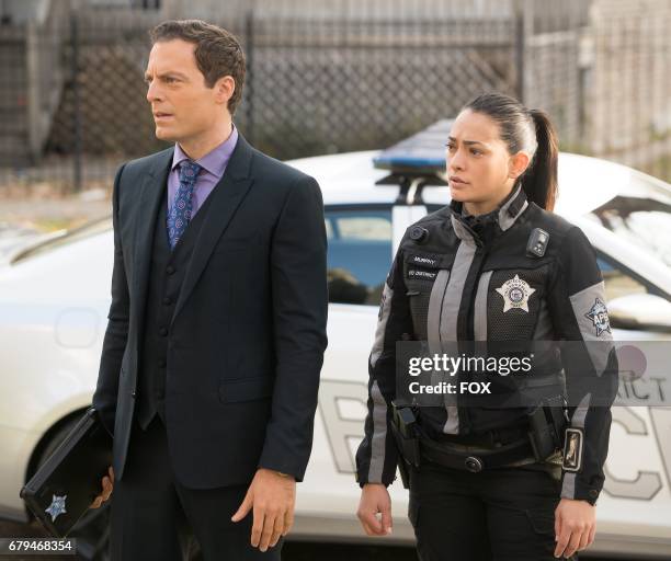 Justin Kirk and Natalie Martinez in the all-new Strange Bedfellows episode of APB airing Monday, April 10 on FOX.