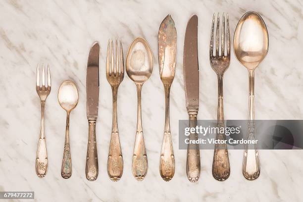 old pieces of cutlery - eetgerei stockfoto's en -beelden