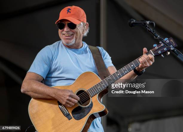 Jimmy Buffett performs with Dave Matthews and Tim Reynolds during the New Orleans Jazz & Heritage Festival 2017 at Fair Grounds Race Course on May 5,...