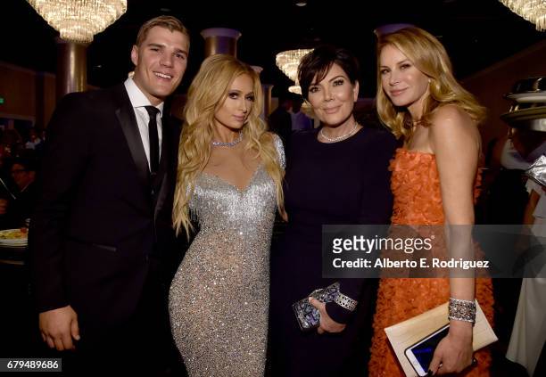 Actor Chris Zylka, Paris Hilton, TV personality Kris Jenner and fashion designer Dee Ocleppo attend the 24th Annual Race To Erase MS Gala at The...