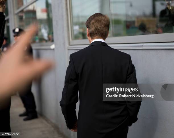 Protesters heckle an invited guest to a formal event attended by President Donald Trump near the USS Intrepid where the President is scheduled to...