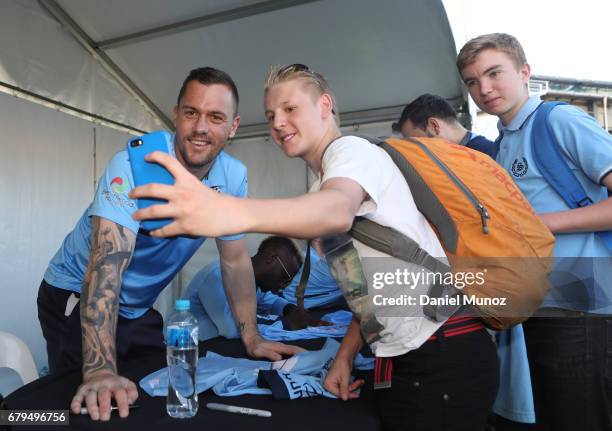Goalkeeper Danny Vukovic poses for a picture with fans during a Sydney FC A-League media opportunity at The Entertainment Quarter on May 6, 2017 in...