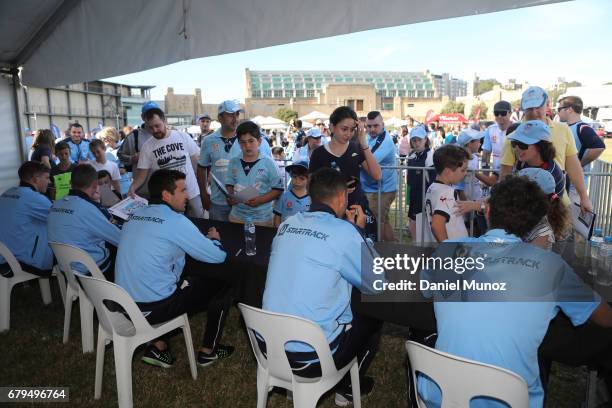 Players sign autographs during a Sydney FC A-League media opportunity at The Entertainment Quarter on May 6, 2017 in Sydney, Australia.