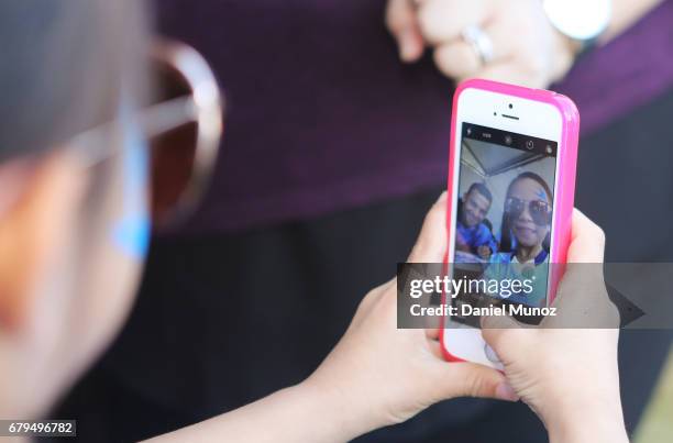 Girl takes a selfie with striker Bobo during a Sydney FC A-League media opportunity at The Entertainment Quarter on May 6, 2017 in Sydney, Australia.