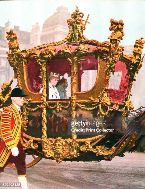 King George V and Queen Mary in the historic State Coach, 1935. From 'The Illustrated London News Silver Jubilee Record Number 1910-1935'. [The...