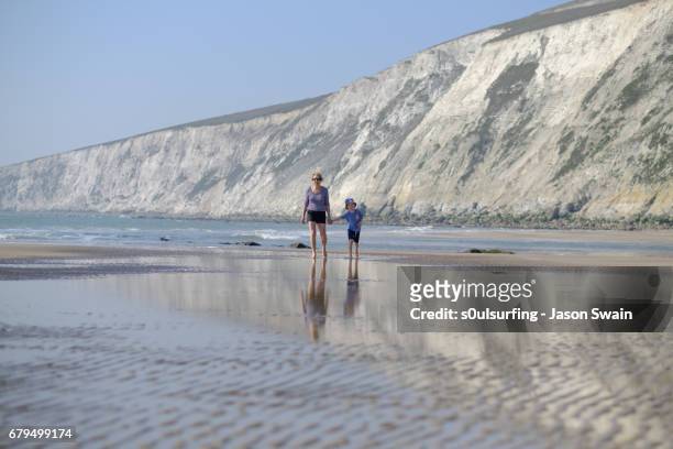 family beach time - freshwater bay isle of wight stock pictures, royalty-free photos & images