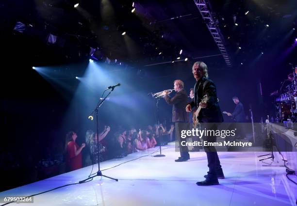 Musician Lee Lougnane and Jeff Coffey of Chicago perform at the 24th Annual Race To Erase MS Gala at The Beverly Hilton Hotel on May 5, 2017 in...