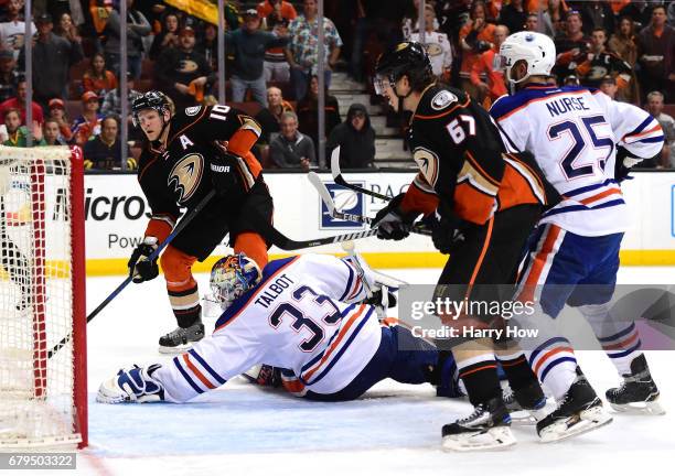 Corey Perry of the Anaheim Ducks scores on Cam Talbot of the Edmonton Oilers for a 4-3 win during the second overtime period in Game Five of the...