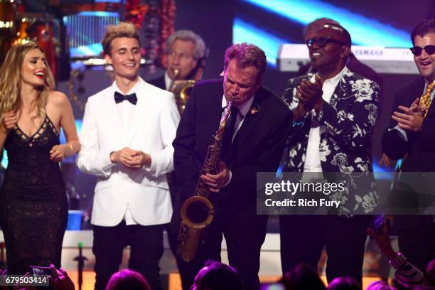 Influencers Kirsten Collins and Christian Collins, Musicians Ray Herrmann and Randy Jackson, and actor Jason Davis are seen onstage during the 24th...