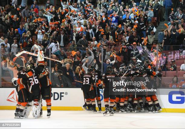 The Ducks celebrate after Anaheim Ducks Right Wing Corey Perry scores the game winning goal in the second overtime period during game 5 of the second...