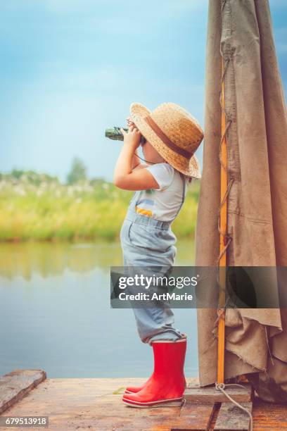 child traveling on raft - little russian girls stock pictures, royalty-free photos & images