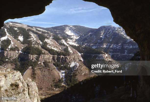 the bear range of mountains in logan canyon utah as seen from mouth of a limestone cave - logan utah stock pictures, royalty-free photos & images