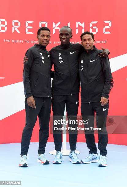 Lelisa Desisa, Eliud Kipchoge and Zersenay Tadese celebrate the Nike Breaking2: Sub-Two Marathon Attempt at Autodromo di Monza on May 6, 2017 in...