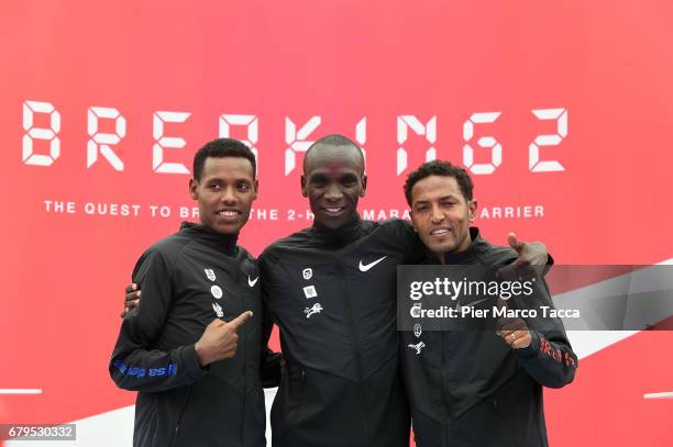 Lelisa Desisa, Eliud Kipchoge and Zersenay Tadese celebrate the Nike Breaking2: Sub-Two Marathon Attempt at Autodromo di Monza on May 6, 2017 in...