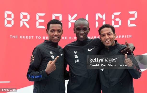Lelisa Desisa, Eliud Kipchoge and Zersenay Tadese celebrate the Nike Breaking2: Sub-Two Marathon Attempt at Autodromo di Monza on May 6, 2017 in...