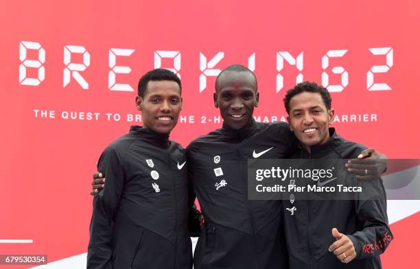 Lelisa Desisa, Eliud Kipchoge and Zersenay Tadese celebrate the Nike Breaking2: Sub-Two Marathon Attempt at Autodromo di Monza on May 6, 2017 in...