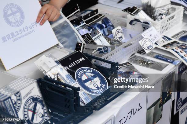 Official goods are on sale prior to the J.League J3 match between Kagoshima United and Cerezo Osaka U-23 at Kamoike Stadium on May 6, 2017 in...
