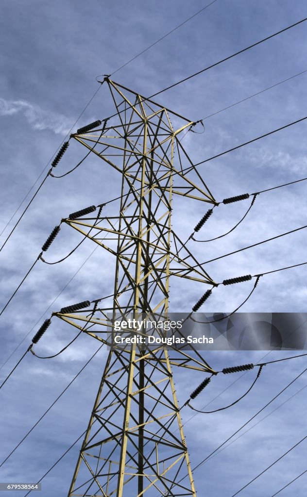 Multiple power lines on overhead tower