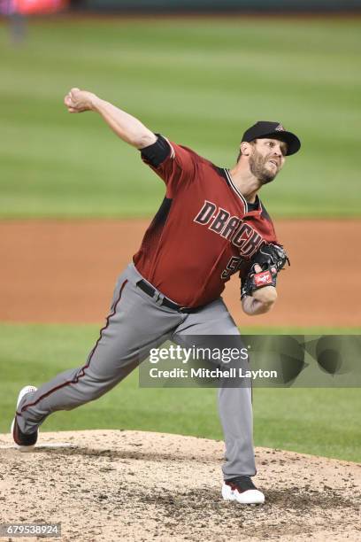 Tom Wilhelmsen of the Arizona Diamondbacks pitches during a baseball game against the Washington Nationals at Nationals Park on May 3, 2017 in...